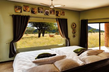 Namibia Okonjima Plains Camp Zimmer Ausblick Iwanowskis Reisen - afrika.de