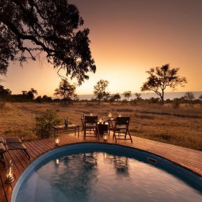 Botswana Linyanti Selinda Explorers Camp Pool Sonnenuntergang Iwanowskis Reisen - afrika.de