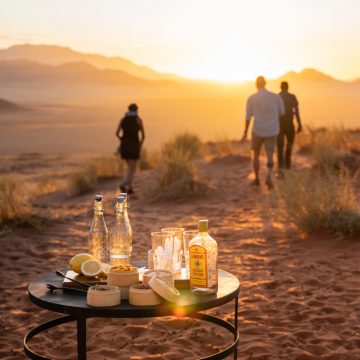Namibia NamibRand Nature Reserve Wolwedans Dune Camp Sundowner Iwanowskis Reisen - afrika.de